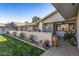 Brick patio with potted plants and seating area at 12719 W Shadow Hills Dr, Sun City West, AZ 85375