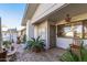 Welcoming front patio with seating and lush plants at 12719 W Shadow Hills Dr, Sun City West, AZ 85375