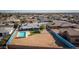 Aerial view of home with pool and landscaped backyard at 13034 N 98Th Dr, Sun City, AZ 85351