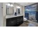 Bathroom features a double vanity and shower at 13034 N 98Th Dr, Sun City, AZ 85351