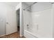 Bathroom showcasing shower and tub combination with tile surround and brushed nickel finishes at 1328 E Binner Dr, Chandler, AZ 85225