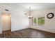 Bright dining room with hardwood floors and chandelier at 1328 E Binner Dr, Chandler, AZ 85225