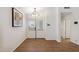 Inviting foyer with neutral colors, wood-look floors, and double doors at 1328 E Binner Dr, Chandler, AZ 85225