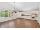 Open kitchen with white cabinets, neutral countertops, and stainless steel appliances at 1328 E Binner Dr, Chandler, AZ 85225