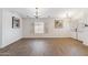 Bright living room with wood-look floors, neutral walls, and ample natural light at 1328 E Binner Dr, Chandler, AZ 85225