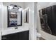 Cozy bathroom featuring a sleek vanity and a unique shower curtain with a guitar design at 14 E Peppergrass Pl, San Tan Valley, AZ 85143