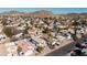 Aerial view of neighborhood with houses and palm trees at 1436 E Rosemonte Dr, Phoenix, AZ 85024