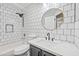 Clean bathroom with white subway tile and a modern vanity at 1436 E Rosemonte Dr, Phoenix, AZ 85024