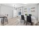 Elegant dining room with a farmhouse table and modern chairs at 1436 E Rosemonte Dr, Phoenix, AZ 85024