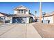 Two-story house with gray garage door and terracotta tile roof at 1436 E Rosemonte Dr, Phoenix, AZ 85024