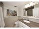 Clean bathroom with a toilet and a vanity with a sink at 15050 N Thompson Peak Pkwy # 1010, Scottsdale, AZ 85260