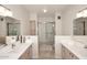 Elegant bathroom with double vanity and walk-in shower at 15050 N Thompson Peak Pkwy # 1010, Scottsdale, AZ 85260