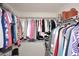 Well-organized walk-in closet with ample hanging space and shelving at 15050 N Thompson Peak Pkwy # 1010, Scottsdale, AZ 85260