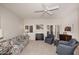 Living room with fireplace and access to patio at 15050 N Thompson Peak Pkwy # 1010, Scottsdale, AZ 85260