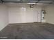 Empty garage with automatic opener and water heater at 15818 N 25Th St # 116, Phoenix, AZ 85032