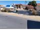 Front view of house, boat parked in driveway, desert landscaping at 15829 N 12Th St, Phoenix, AZ 85022