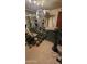 Home gym with weights and a weight machine at 15829 N 12Th St, Phoenix, AZ 85022