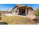 Backyard with covered patio and gravel at 15913 W Elm St, Surprise, AZ 85374