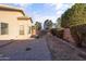 Landscaped backyard with gravel and a block wall at 15913 W Elm St, Surprise, AZ 85374