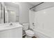 Clean bathroom with a tub, shower, and vanity at 15913 W Elm St, Surprise, AZ 85374