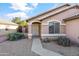 Front entry with walkway, landscaping, and exterior light at 15913 W Elm St, Surprise, AZ 85374