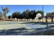 Outdoor basketball court with marked playing area at 1616 N 125Th Ln, Avondale, AZ 85392