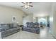 Spacious living room with plush seating and high ceilings at 1616 N 125Th Ln, Avondale, AZ 85392