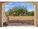 Covered patio with gravel and desert landscaping at 16955 W Holly St, Goodyear, AZ 85395