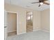 Bedroom with access to bathroom and closet at 16955 W Holly St, Goodyear, AZ 85395