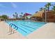 Resort-style pool with lap lanes and shade structures at 16955 W Holly St, Goodyear, AZ 85395