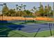 Well-maintained tennis courts with ample lighting at 16955 W Holly St, Goodyear, AZ 85395