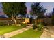 Landscaped backyard with firepit and seating area at 1837 E Minnezona Ave, Phoenix, AZ 85016