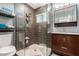 Modern bathroom with walk-in shower and updated vanity at 1837 E Minnezona Ave, Phoenix, AZ 85016