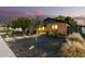 Landscaped front yard with brick home and walkway at 1837 E Minnezona Ave, Phoenix, AZ 85016