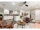 Modern white kitchen with stainless steel appliances and an island at 1837 E Minnezona Ave, Phoenix, AZ 85016