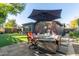 Relaxing patio with seating area and fire pit, near the house at 1837 E Minnezona Ave, Phoenix, AZ 85016