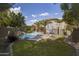 Landscaped backyard oasis with refreshing pool at 1908 E Hawken Pl, Chandler, AZ 85286