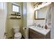 Bathroom with modern vanity and light fixtures at 1908 E Hawken Pl, Chandler, AZ 85286