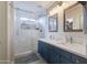 Elegant bathroom with double vanity and shower at 1908 E Hawken Pl, Chandler, AZ 85286