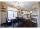 Farmhouse style dining area with large window at 1908 E Hawken Pl, Chandler, AZ 85286