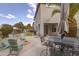 Relaxing patio with fire pit and seating area at 1908 E Hawken Pl, Chandler, AZ 85286