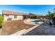 Spacious backyard with a large kidney-shaped pool at 2047 E Devon Rd, Gilbert, AZ 85296