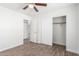 Bedroom with wood-look floors and spacious closet at 2047 E Devon Rd, Gilbert, AZ 85296