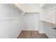 Large walk-in closet with ample shelving and hanging space at 2125 E Voltaire Ave, Phoenix, AZ 85022