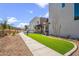 Landscaped area with artificial turf at 2125 E Voltaire Ave, Phoenix, AZ 85022