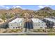 Aerial view of modern townhouses with mountain backdrop at 2126 E Voltaire Ave, Phoenix, AZ 85022