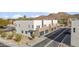 Aerial view showcasing modern townhouses, private garages, and mountain backdrop at 2126 E Voltaire Ave, Phoenix, AZ 85022