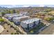 Aerial view of modern townhouses with private garages and desert landscaping at 2126 E Voltaire Ave, Phoenix, AZ 85022