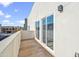 Private balcony with sliding glass doors and views of neighborhood at 2126 E Voltaire Ave, Phoenix, AZ 85022