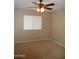 Bright bedroom with ceiling fan and window blinds at 2208 W Lindner Ave # 17, Mesa, AZ 85202